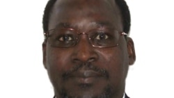 Père Janvier Marie Gustave Yameogo joint par Jacques Aristide