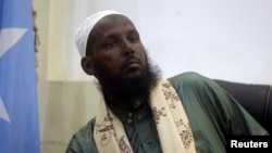 FILE - Former al-Shabab leader Mukhtar Robow attends a news conference in Mogadishu, Somalia, Aug. 15, 2017. 