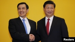 习近平、马英九新加坡握手