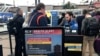 Companies Trim Outlooks, Travel and Staff as Virus Spreads