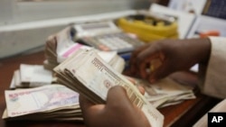 Photo prise le 20 octobre 2015 dans un bureau de change à Lagos, Nigeria, le 20 juin 2016.