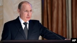 Russian President Vladimir Putin speaks before officials of the Federal Security Service in Moscow, March 26, 2015. 