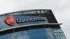 FILE - General view outside GlaxoSmithKline (GSK) headquarters in Brentford, Britain, May 4, 2020.