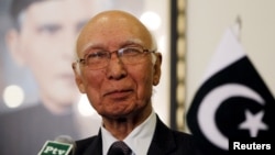 FILE - Adviser to Pakistan's Prime Minister on National Security and Foreign Affairs Sartaj Aziz listens to a question during a news conference with Iranian Foreign Minister Javad Zarif at the Foreign Ministry in Islamabad, April 8, 2015. 