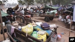 A Cambodian refugee sleeps on a hammock at a refugee camp at Tnol Toteng village, east of the famed Preah Vihear temple. Thailand accused Cambodia of refusing to negotiate to resolve a border dispute that led to the fourth straight day of fierce clashes M