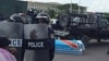Dispersion de la procession funéraire d’un militant anti-Kabila à Kinshasa