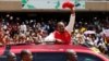 Kenya's President Uhuru Kenyatta waves to supporters as he arrives at the Kasarani stadium for the official launch of the Jubilee Party ahead of the 2017 general elections in Kenya's capital Nairobi, Sept. 10, 2016.