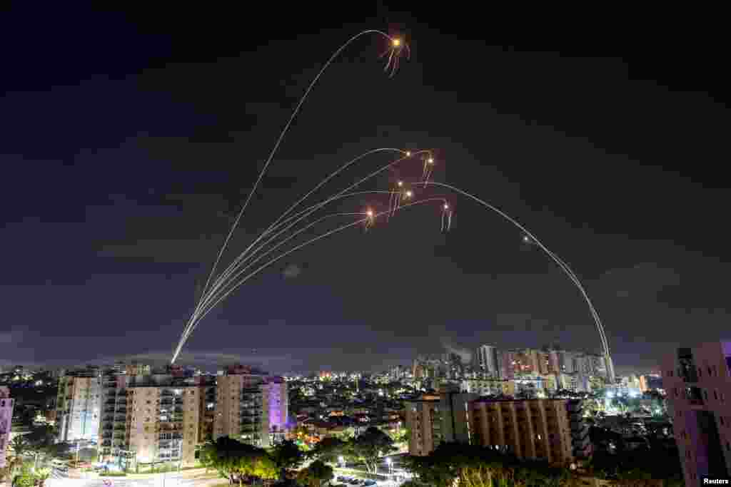 Israel's Iron Dome anti-missile system intercepts rockets launched from the Gaza Strip, as seen from Ashkelon in southern Israel, Oct. 8, 2023.