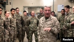 Marine General Kenneth McKenzie, head of U.S. Central Command, speaks with U.S. troops while visiting Forward Operating Base Fenty in Jalalabad, Afghanistan, Sept. 9, 2019.