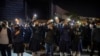 Protesters wave their smartphones as they sing "Glory to Hong Kong" during a rally for secondary school students near the Hong Kong Museum of Art in Hong Kong, Dec. 13, 2019. 