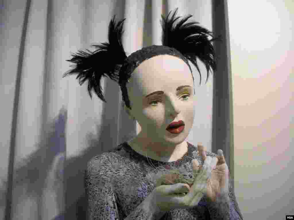 A porcelain figure, from “The Shadow Circus” collection by Kirsten Stingle at the 2013 Smithsonian Craft Show.