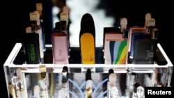 FILE - Vaping pen devices are displayed at The Cannabis World Congress & Business Exposition (CWCBExpo) trade show in New York City, New York, May 30, 2019.