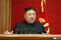 March 6, 2021 photo released by North Korea's official Korean Central News Agency (KCNA) shows North Korean leader Kim Jong Un speaking at First Short Course for Chief Secretaries of City and County Party Committees in Pyongyang.