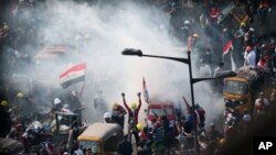 د عراق له تاوتریخوالي ډکې مظاهرې