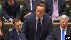 PM Inggris David Cameron saat menyampaikan pidato di hadapan anggota parlemen Inggris di London (2/12). 