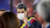 El presidente de Venezuela, Nicolás Maduro, hace un gesto mientras asiste a una ceremonia que marca la apertura del nuevo período judicial, en Caracas, Venezuela, el 27 de enero de 2022.