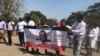 Doctors and nurses in Zimbabwe protest the disappearance of Peter Gabriel Magombeyi, acting president of the Zimbabwe Hospital Doctors Association, in Harare, Sept. 17, 2019. (C. Mavhunga/VOA)