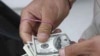 تاکید دولت بر تعدیل نرخ ارز در ایران