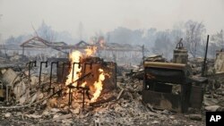 La Californie est ravagée depuis des mois par de vastes incendies (AP Photo/Eric Risberg)