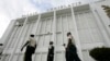 Guards patrol front of Haiti's parliament - Palais Legislatif - in Port-au-Prince. 
