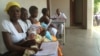 Mothers receiving postnatal care at St Luke’s Hospital,in Lupane, about 600 kilometers southwest of Harare, Zimbabwe, Nov. 20, 2014. (Sebastian Mhofu/VOA)