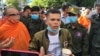 FILE - Thun Ratha, an activist of Mother Nature Cambodia, takes part in a protest at a Caltex gasoline station in Phnom Penh, Cambodia, on July 8, 2020. (Hul Reaksmey/VOA Khmer) 