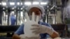 FILE - Malaysia produces roughly two-thirds of the world's disposable rubber gloves.