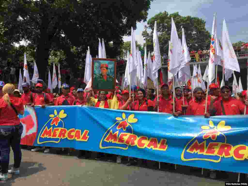 Supporters of Venezuelan President Nicolas Maduro march in Caracas on May Day, May 1, 2019.