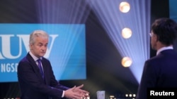 Dutch far-right politician Geert Wilders of the PVV party speaks during the televised debate with Dutch Prime Minister Mark Rutte of the VVD Liberal party, in Amsterdam, Netherlands, March 11, 2021.