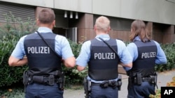FILE - German police officers. 