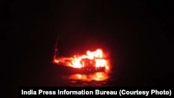 India's Ministry of Defense released this photo that it says shows a Pakistani fishing boat that exploded and burned after those aboard the boat set it on fire after being chased by Indian Coast Guard ships on January 1, 2015.