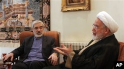 Iranian opposition leaders Mahdi Karroubi, right, and Mir Hossein Mousavi (file photo)
