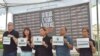International journalist advocates and the wife of a victim, Edita Tiamzon remember the 58 dead on the fifth anniversary of one of the most violent incidents of election-related violence in the S. Philippines. Quezon City, Philippines. November 23, 2014. (S. Orendain/VOA)