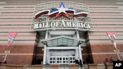 FILE - An entrance to the Mall of America is seen in Bloomington, Minn. 
