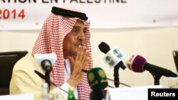 FILE - Then-Saudi Foreign Minister Prince Saud al-Faisal addresses a news conference following a meeting of the Organization of Islamic Cooperation in Jeddah, Aug. 12, 2014.