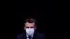 French President Emmanuel Macron reacts as he meets Portuguese Prime Minister Antonio Costa, Dec. 16, 2020, in Paris.
