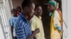 FILE - Young men volunteer for free surgical circumcision at the Harare Central Hospital Spilhaus Family Planning Centre, May 2012. (Courtesy of the Global Fund)