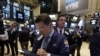 Wall Street termine en baisse, la Chine et la Grèce pèsent