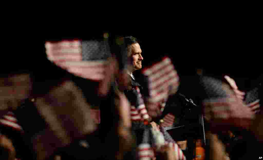 Republican presidential candidate Mitt Romney speaks during a campaign event at the Newport News International Airport, Newport News, Virginia, November 4, 2012.