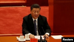 Presiden China Xi Jinping dalam acara peringatan 70 Tahun keterlibatan Relawan Tentara Rakyat China dalam perang Korea, di Beijing, 23 Oktober 2020. (Foto: Reuters)