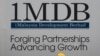FILE - Construction workers chat in front of a billboard for state investment fund 1 Malaysia Development Berhad (1MDB) at the fund's flagship Tun Razak Exchange development in Kuala Lumpur, Malaysia, May 14, 2015.