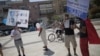 Israelis wave banners calling for peace during a rally for love outside the Egyptian Embassy in Tel Aviv, Israel, September 16, 2011. 