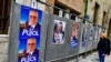Des affiches de campagne de Jean-Marc Pujol, maire de Perpignan et candidat du parti Les Republicains à la municipale, à l'hôtel de ville de Perpignan, France, le 10 mars 2020. (REUTERS/Alexandre Minguez)