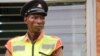 Kanduwa Sande is a police officer with a greater passion for sports. (Lameck Masina/VOA)