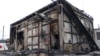 A burned commercial structure is pictured in Maputo, Mozambique, Dec. 24, 2024. More than 6,000 prisoners escaped from a prison near Maputo the next day, amid unrest triggered by confirmation of the Frelimo party as the winner of recent elections.
