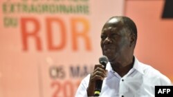 Le président ivoirien et leader du parti libéral RDR (Rassemblement des républicains - Rassemblement des républicains) Alassane Ouattara lors d'un congrès extraordinaire du RDR à Abidjan, le 5 mai 2018.
