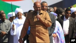 FILE - Sudan’s President Omar al-Bashir addresses supporters at a rally in Khartoum, Sudan, Jan. 9, 2019.