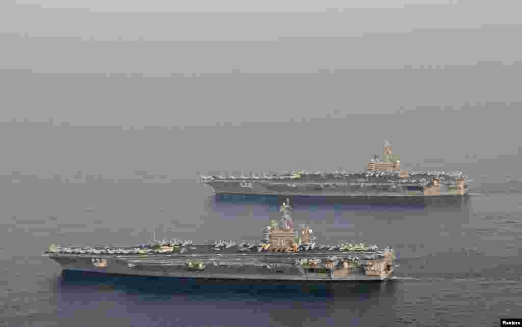 2014年10月18日，美國航空母艦卡爾文森號和布殊號換防。布殊號以老布殊命名。