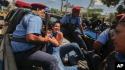 Police detain protesters in Managua, Nicaragua, March 16, 2019.