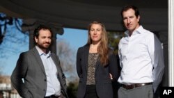 FILE - From left, attorneys David Seligman, Nina DiSalvo and Alexander Hood of Denver's Towards Justice are pictured. In a deal filed Jan. 9, 2019, companies that brought workers to the U.S. to work as au pairs have offered $65.5 million to settle a class-action lawsuit.
